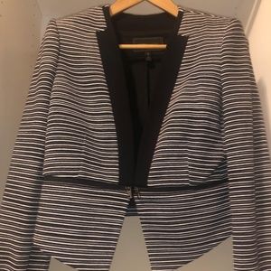 Jacket with bottom half zipper